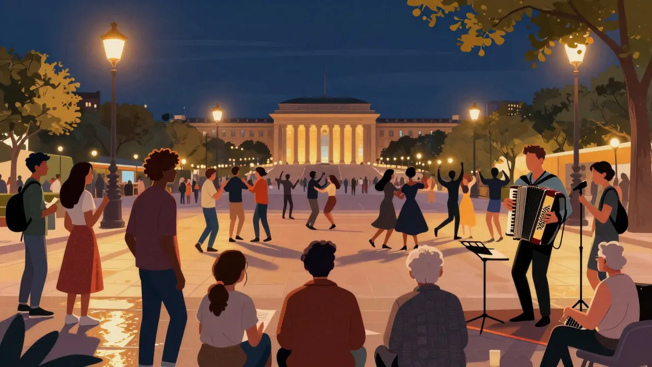 Crowd dancing and listening to live accordion music at Place de la République at night.