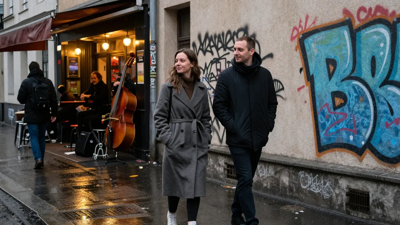 A man and woman walking through a rainy Kreuzberg street past a jazz bar with glowing lights.